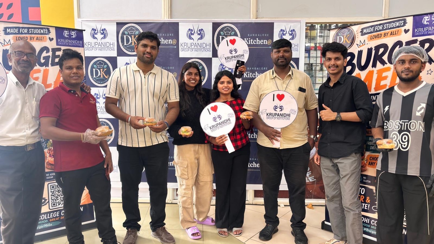 Burger Mela team and students at the Krupanidhi College canteen